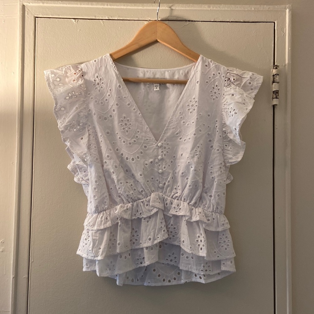 Express eyelet ruffle shoulder top